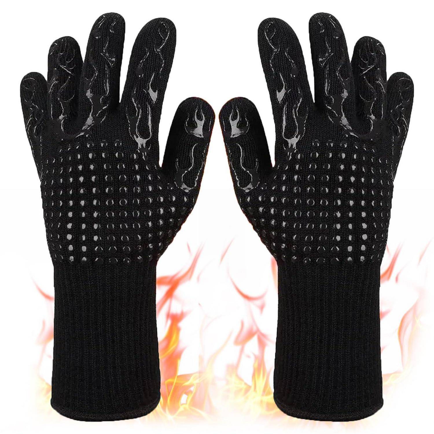 Paar schwarze hitzebeständige Handschuhe mit gepunkteten Griffhandflächen, in der Vorderansicht vor flammendem Hintergrund dargestellt.