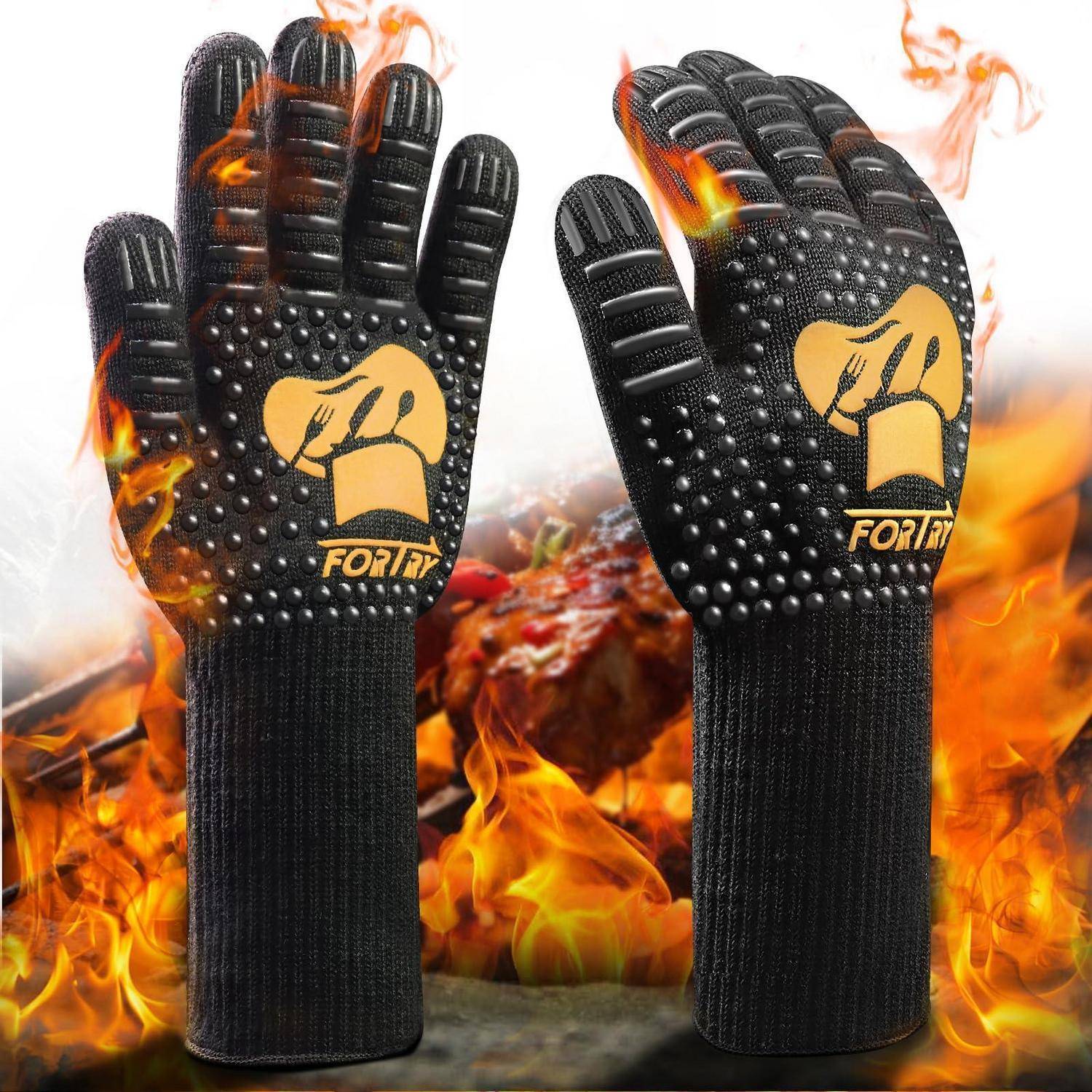 Paar schwarze hitzebeständige Handschuhe mit griffigen gepunkteten Handflächen und langen Manschetten, gezeigt in Flammen, zum Grillen oder für die Handhabung bei hoher Hitze.
