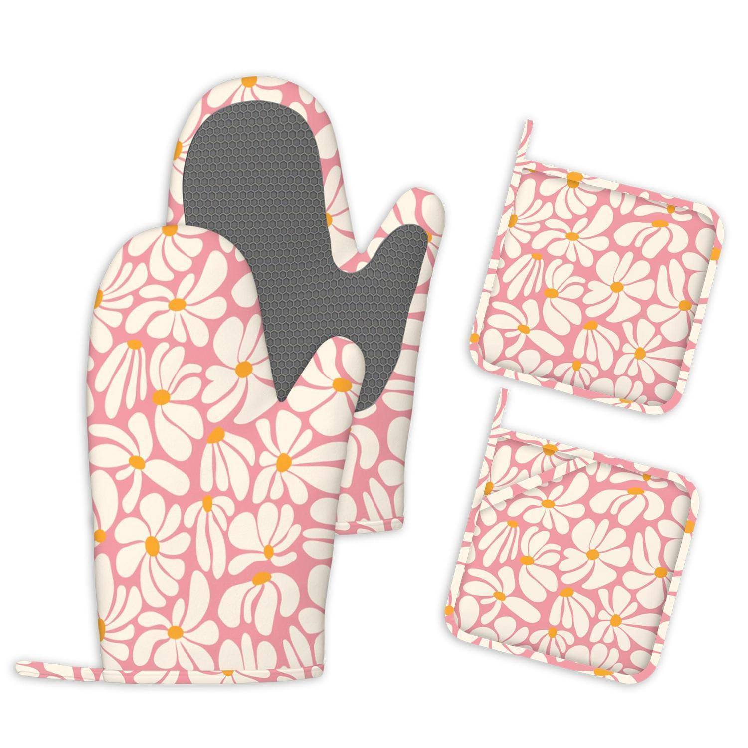 Rosa Backhandschuh mit Blumenmuster und zwei passende Topflappen auf weißem Hintergrund, die ein aufeinander abgestimmtes Küchentextilien-Set zeigen.