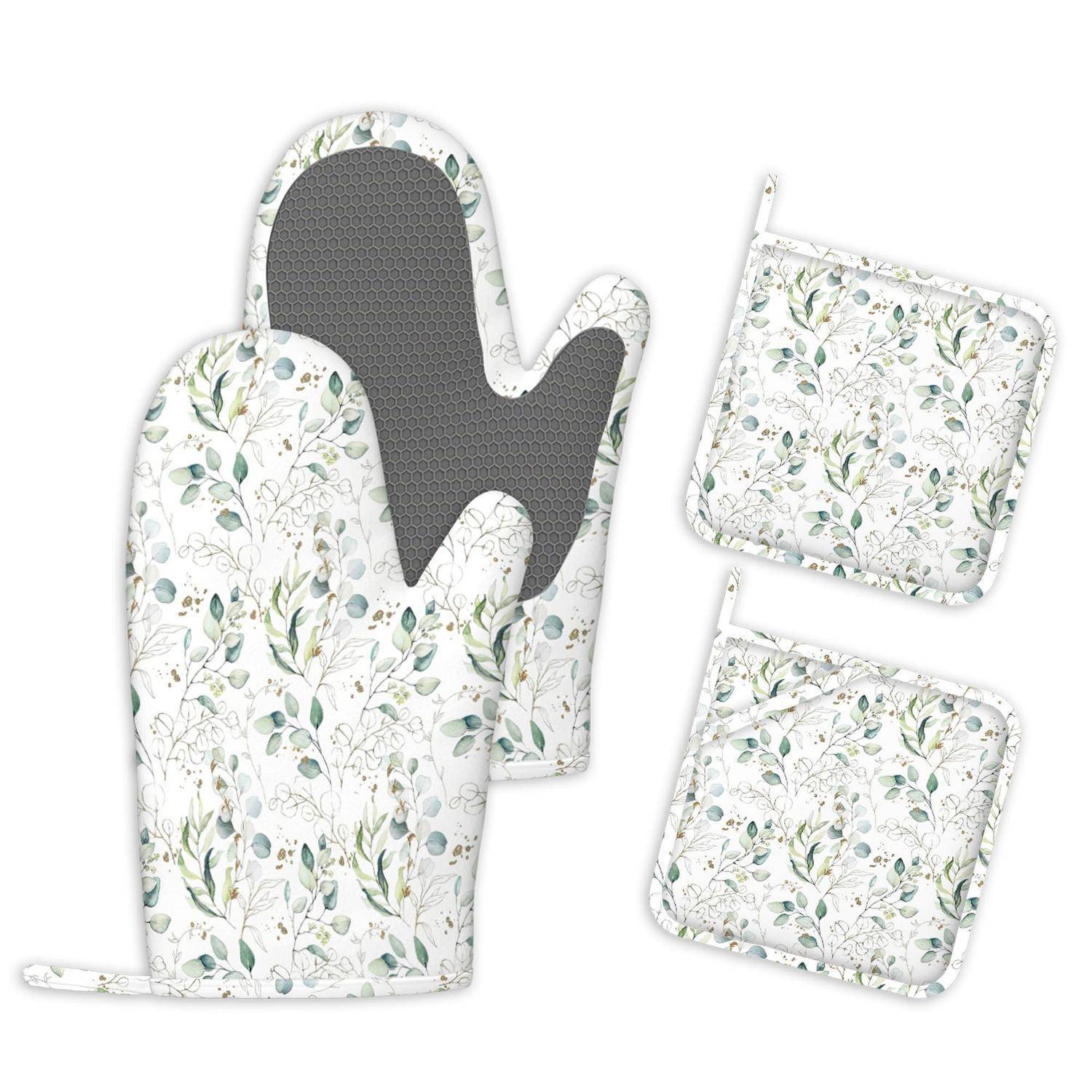Küchenschutz-Set mit Blumenmuster, bestehend aus zwei Ofenhandschuhen und zwei passenden Topflappen, ein Handschuh aufgeklappt mit grauer hitzebeständiger Innenseite.