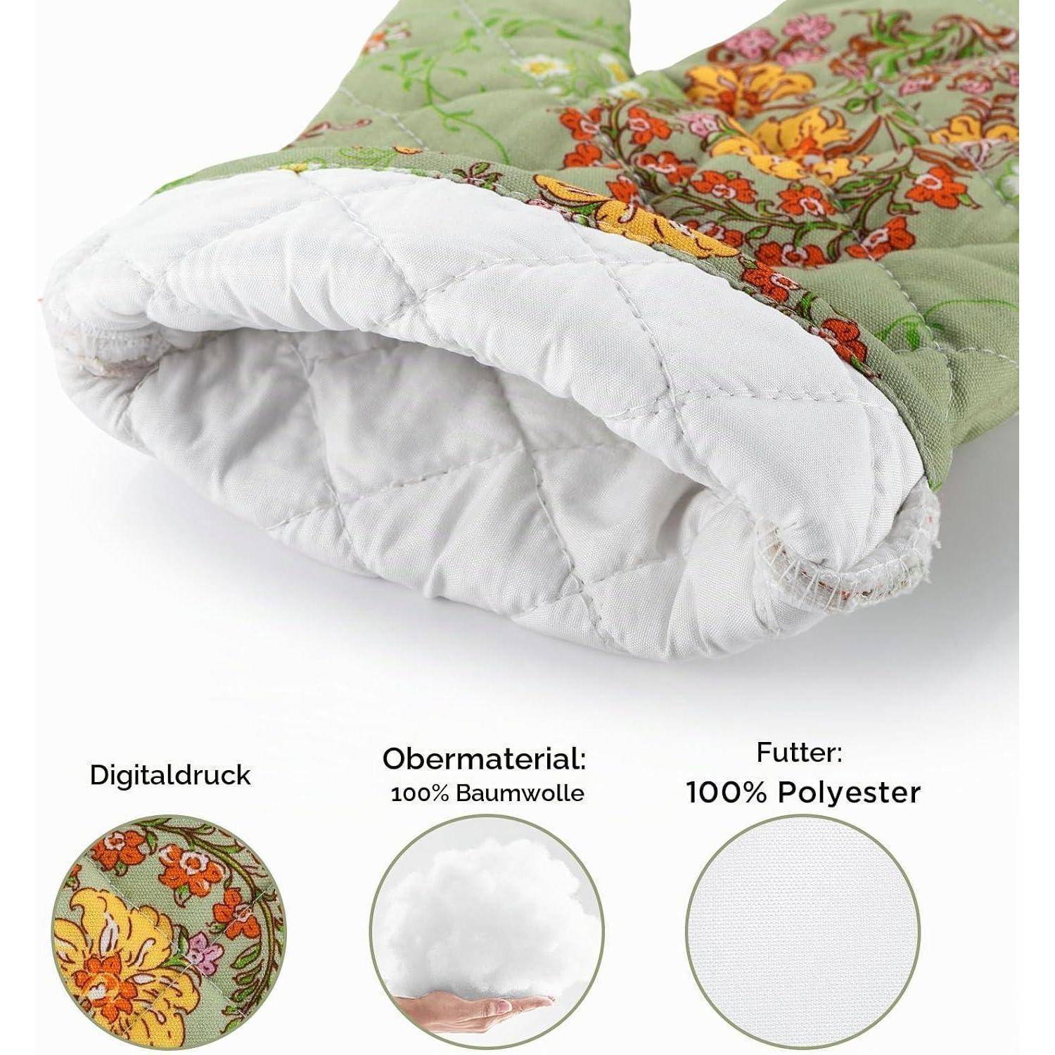 Nahaufnahme eines gesteppten Blumenstoff-Ärmels oder einer Tasche mit weißer gepolsterter Fütterung; Etiketten zeigen Außenmaterial 100 % Baumwolle und Fütterung 100 % Polyester.