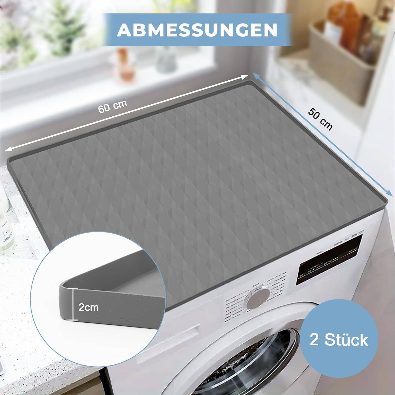 Produktbild von zwei Waschmaschinenabdeckungen mit den Abmessungen 60 cm x 50 cm und einer Kantenhöhe von 2 cm, gekennzeichnet mit '2 Stück'.
