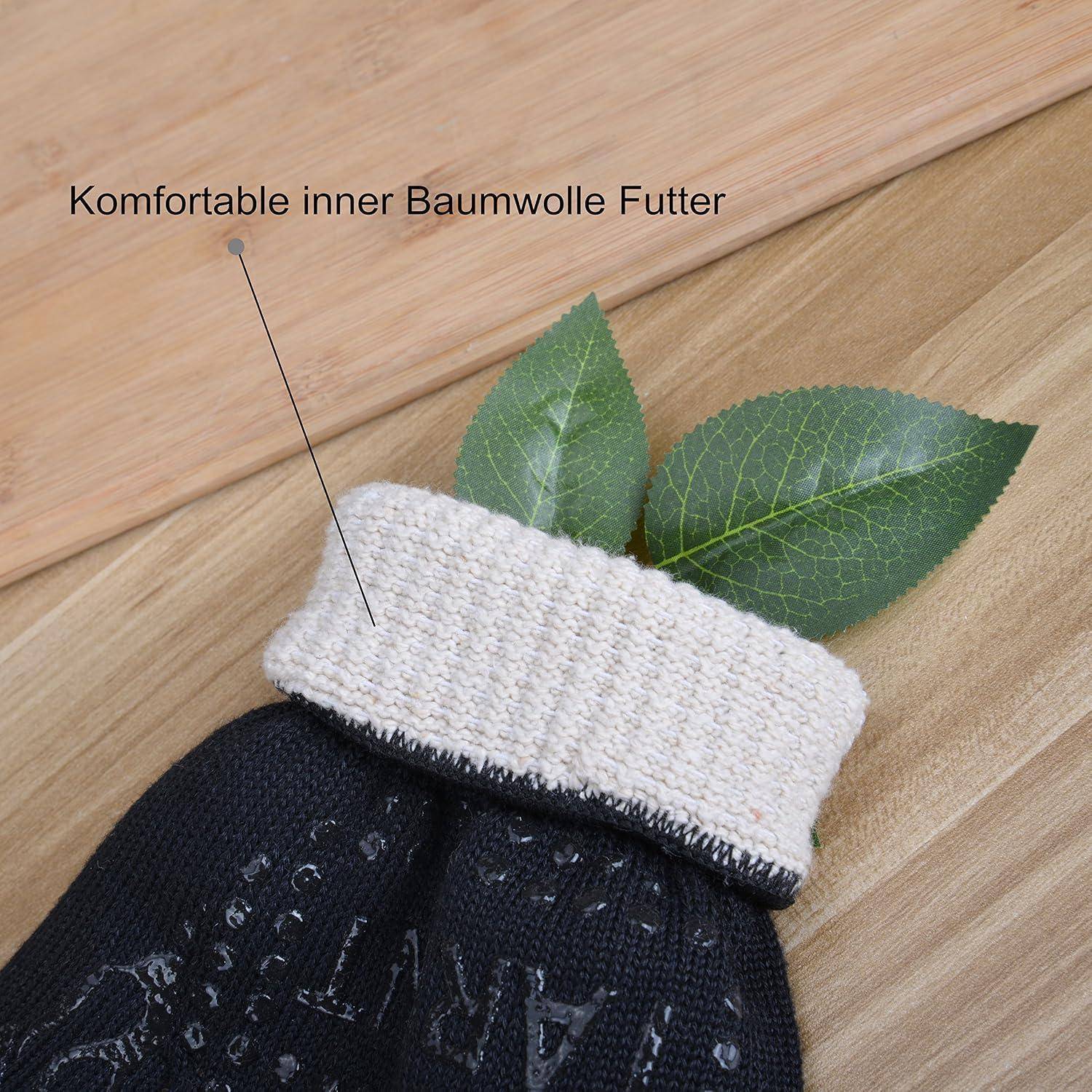 Nahaufnahme eines schwarzen Strickhandschuhs mit weißer Baumwollinnenfütterung, beschriftet mit „Komfortable innere Baumwollenfütterung