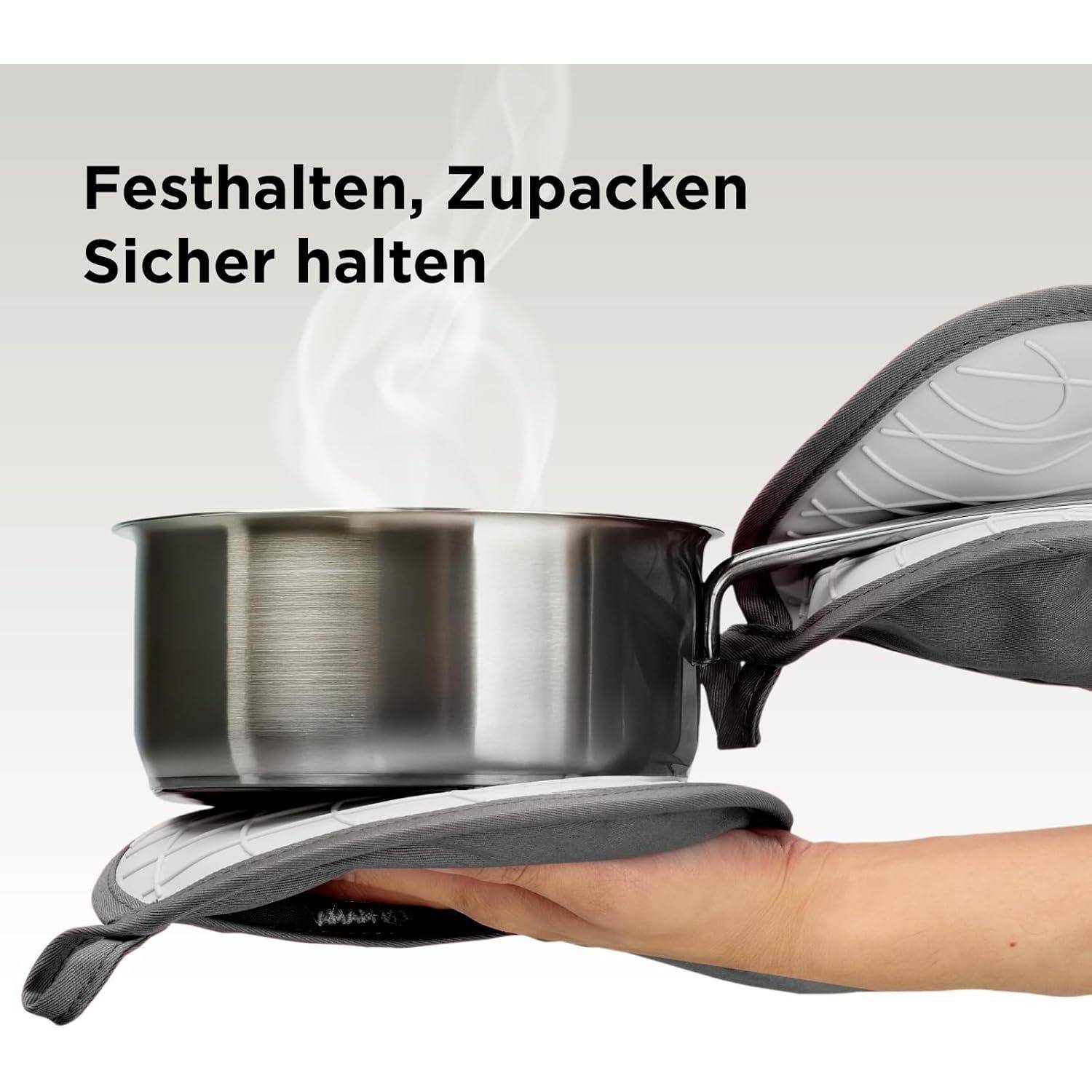 Topfhalter greift eine heiße Pfanne und veranschaulicht 
