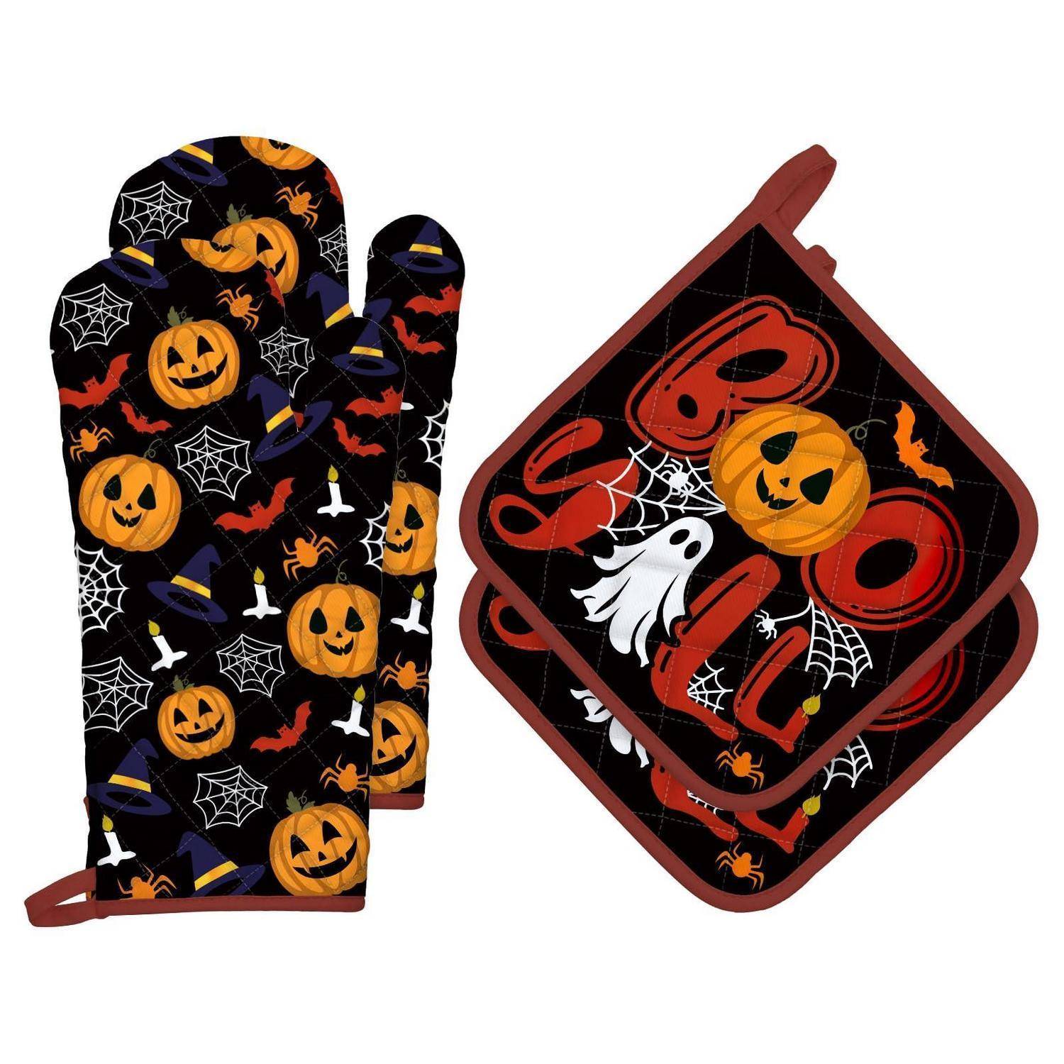 Halloween-Ofenhandschuh und passendes Topflappen mit Kürbisgesicht, Spinnennetz, Gespenst und Fledermaus-Muster auf schwarzem Hintergrund.
