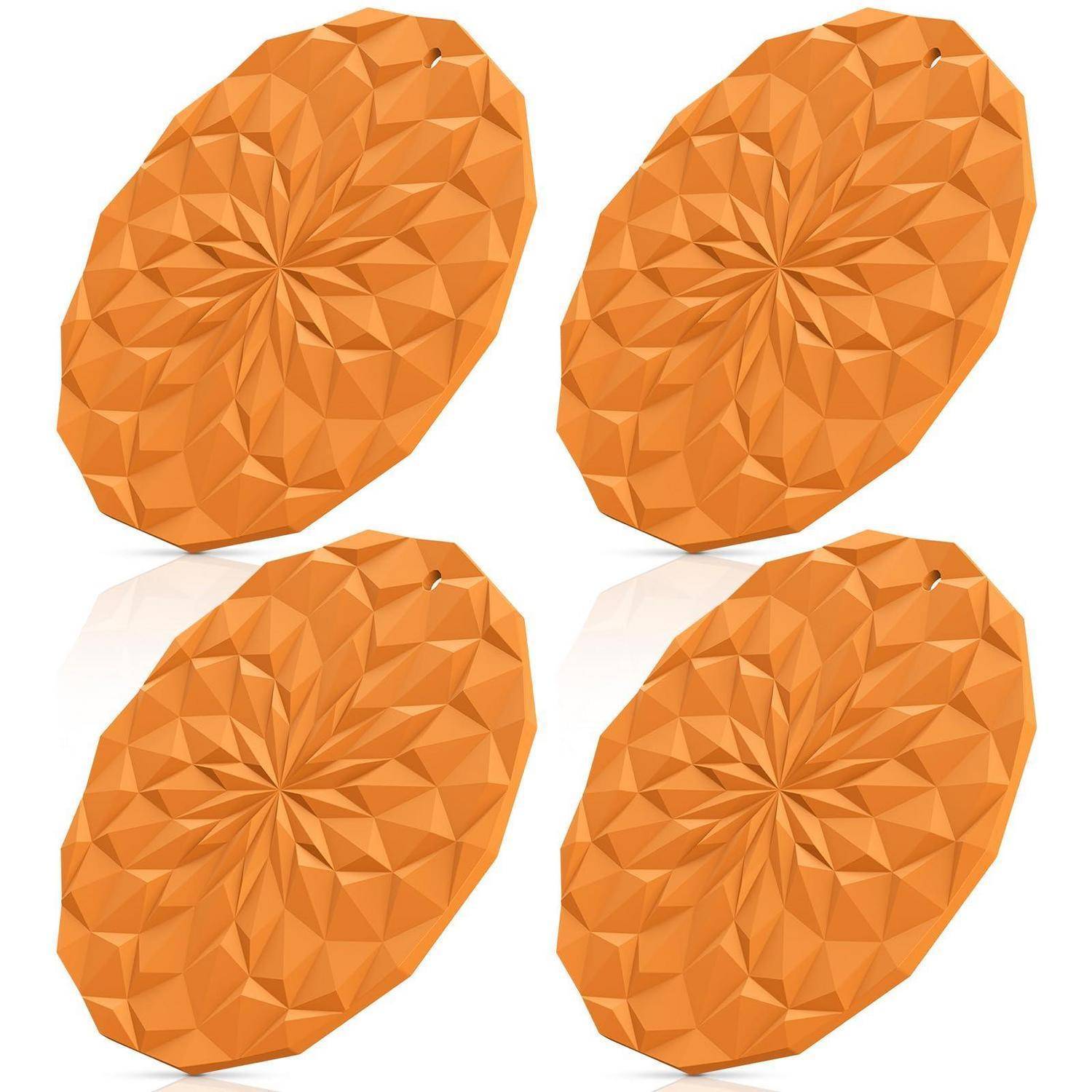 Vier orangefarbene facettierte ovale Scheiben, die in einem 2x2-Raster auf weißem Hintergrund angeordnet sind.