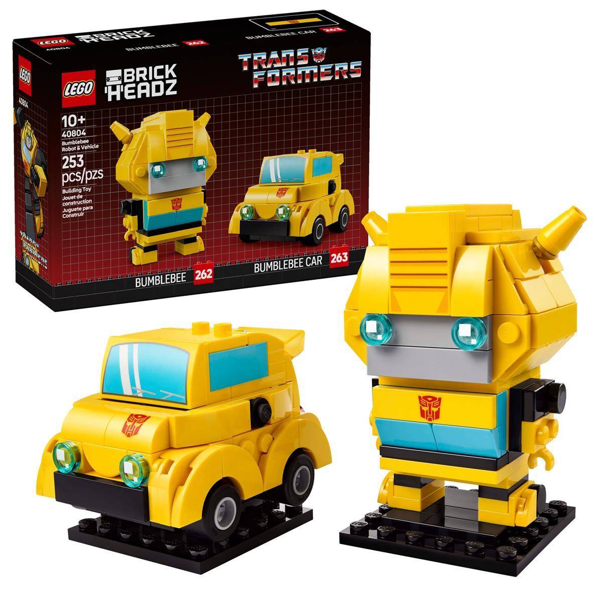 LEGO BrickHeadz Transformers Bumblebee Set mit Schachtelkunstwerk und zwei Modellen: Bumblebee-Roboterfigur und gelber Bumblebee-Auto auf Ständern.