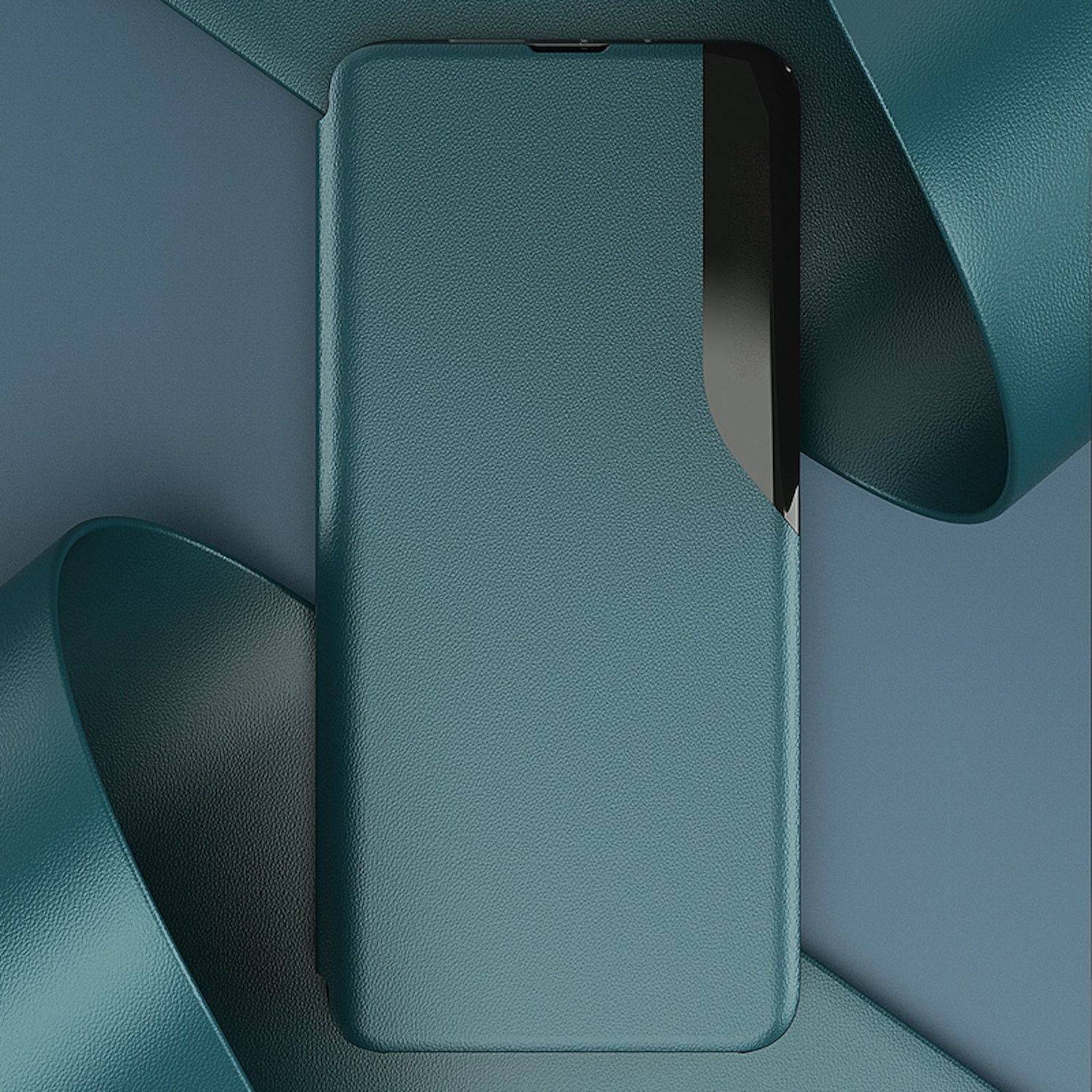 Teal-Smartphone mit strukturierter Hülle liegt auf einer blaugrauen Oberfläche, teilweise umwickelt von passenden teal-farbenen band-ähnlichen Streifen.