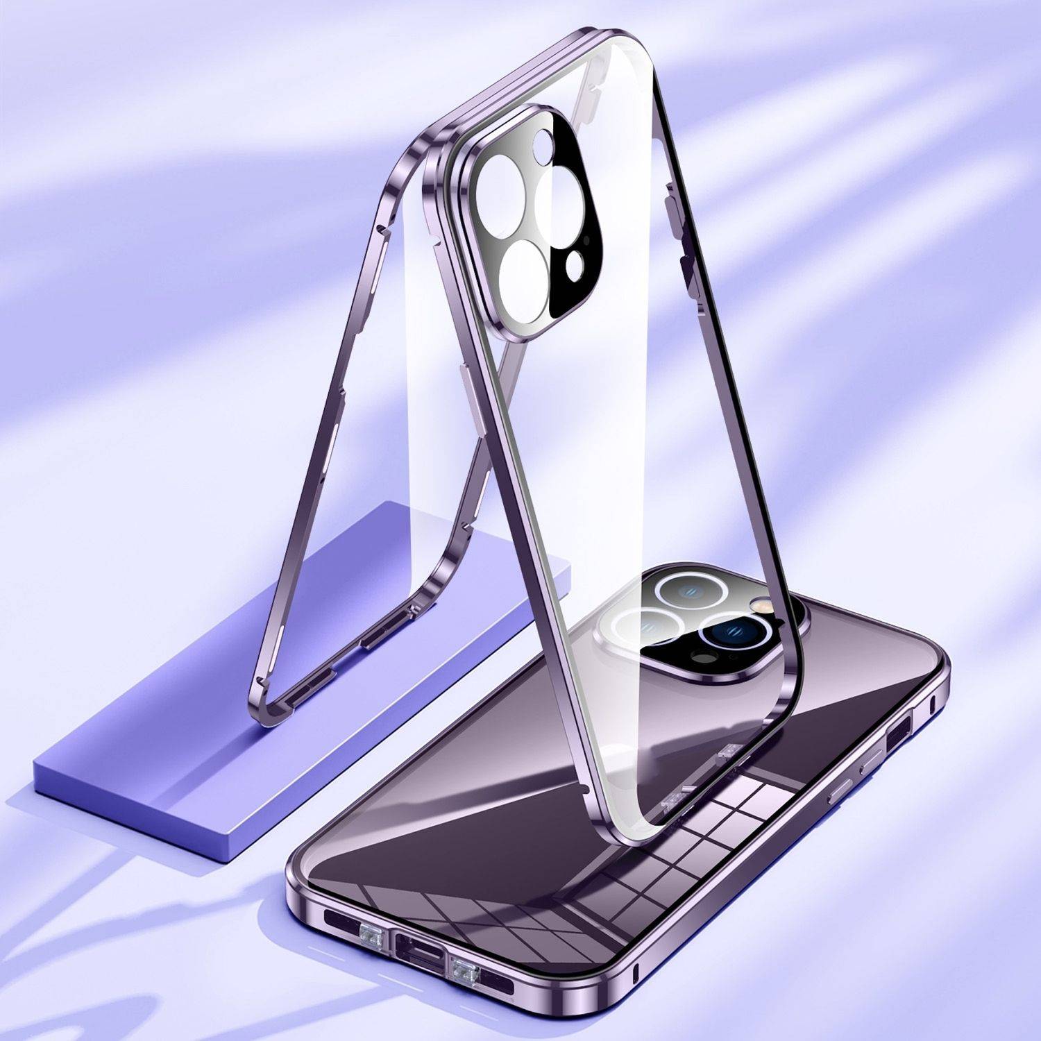 Zwei glänzende Smartphones mit durchsichtigen Hüllen sind zeltförmig auf einem violetten Ständer aufgestellt und zeigen Kameramodule und reflektierende Bildschirme.