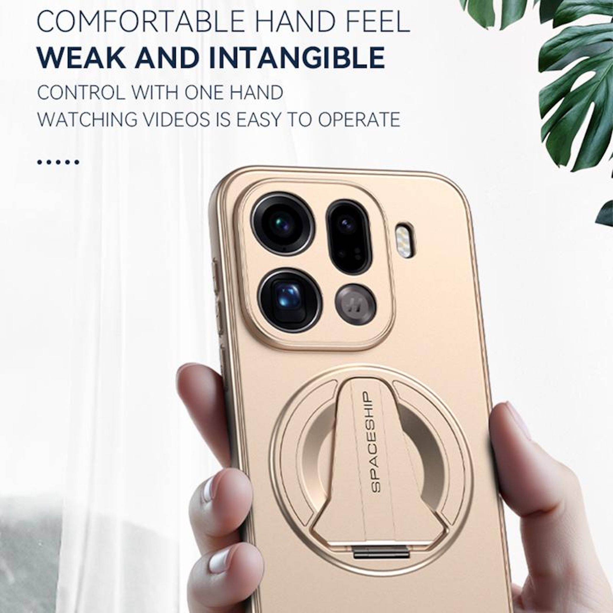 Hand hält ein goldenes Smartphone mit einem kreisförmigen Kickstand-Griff; die Anzeigentext sagt 