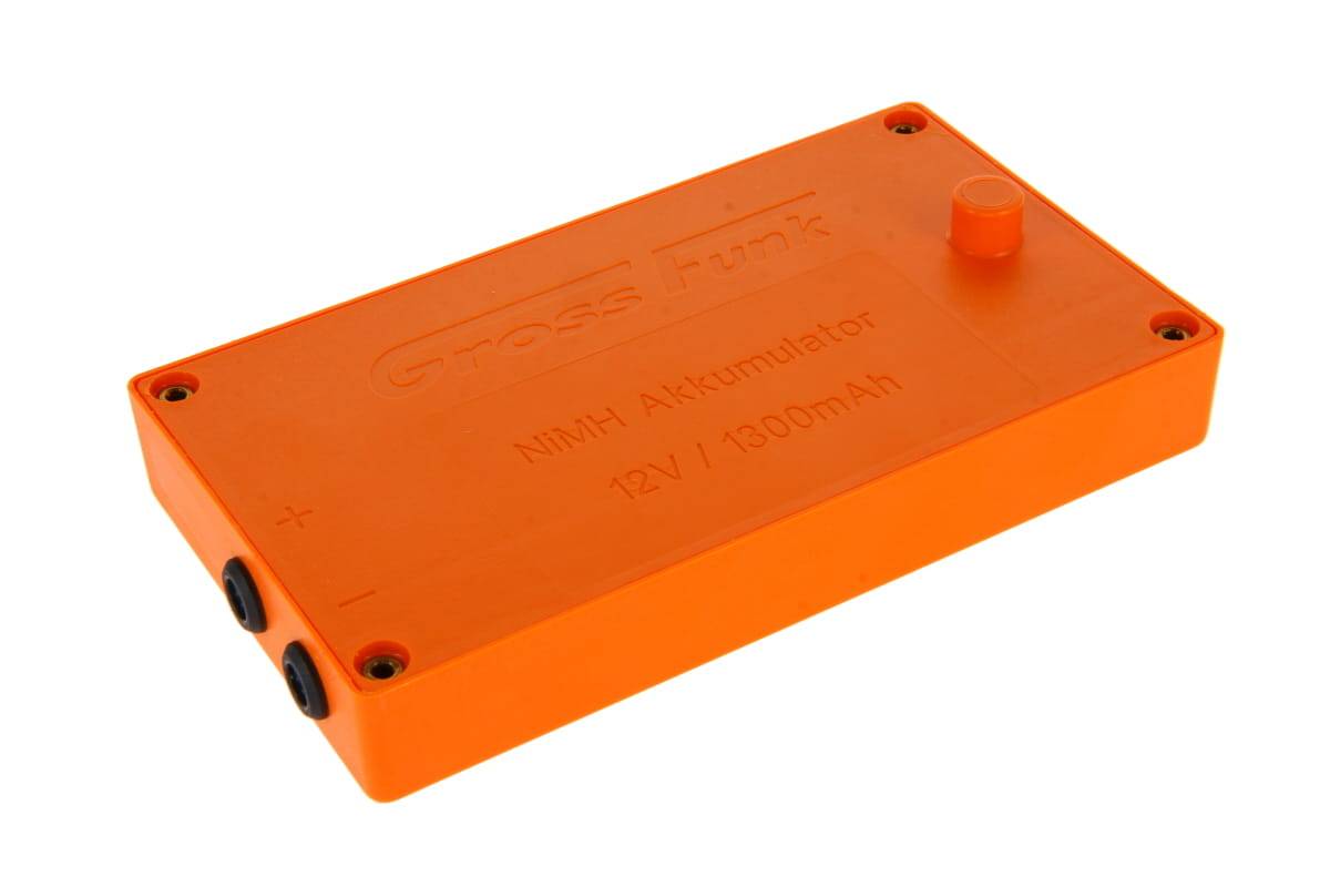 Orangefarbiges rechteckiges Batteriepaket mit der Aufschrift „NiMH Akku 12V / 1000mAh