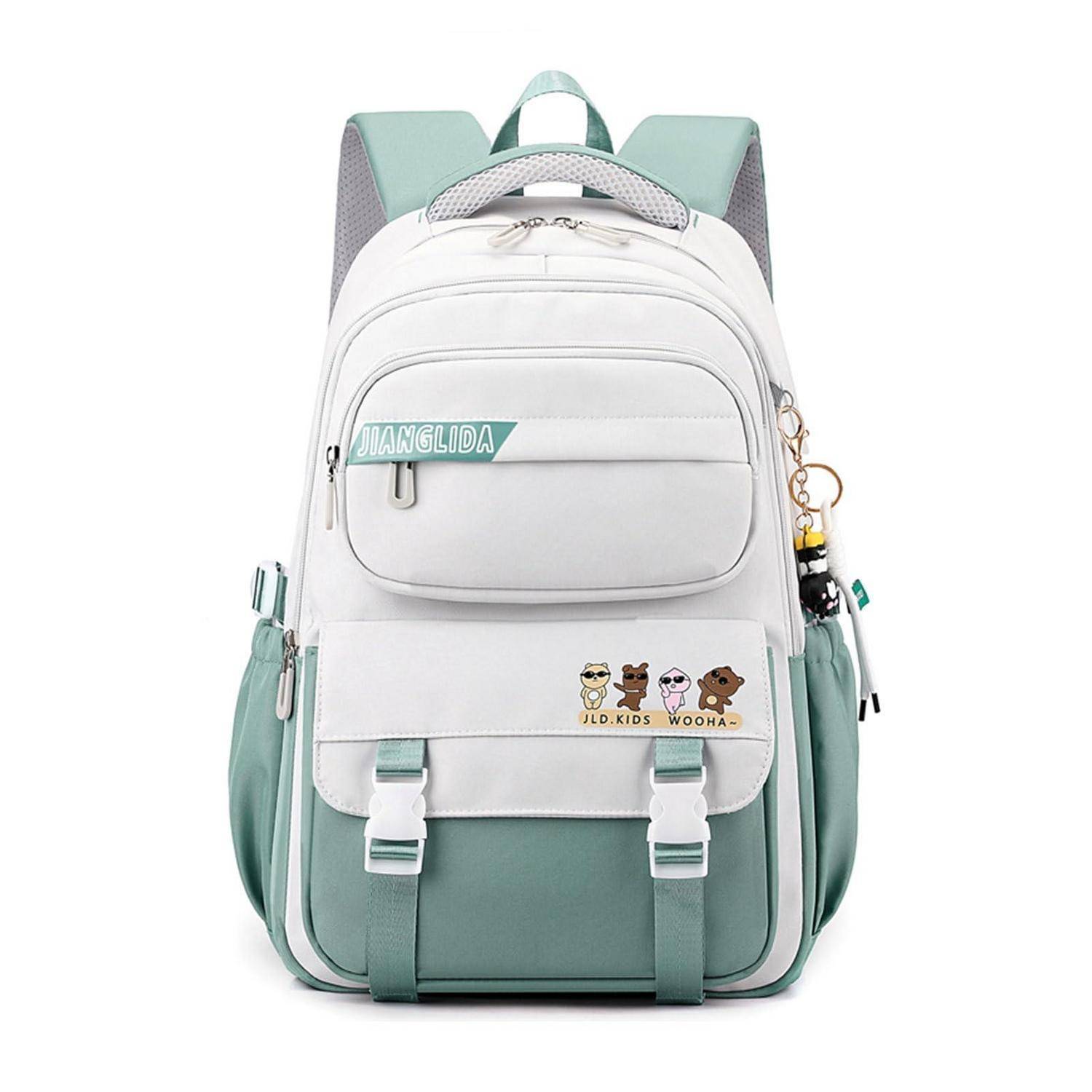 Rucksack für Kinder in Mint und Weiß mit vorderen Taschen, Seitenfächern und Cartoon-Charakter-Aufnähern auf einfachem weißem Hintergrund.