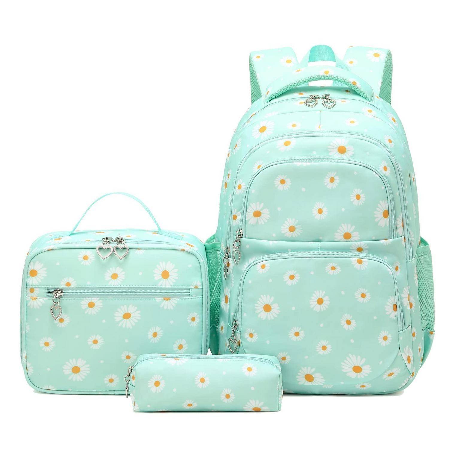 Minzgrüner Rucksack-Set mit Gänseblümchen-Muster bestehend aus großem Rucksack, Lunchbeutel und Federmäppchen auf weißem Hintergrund.