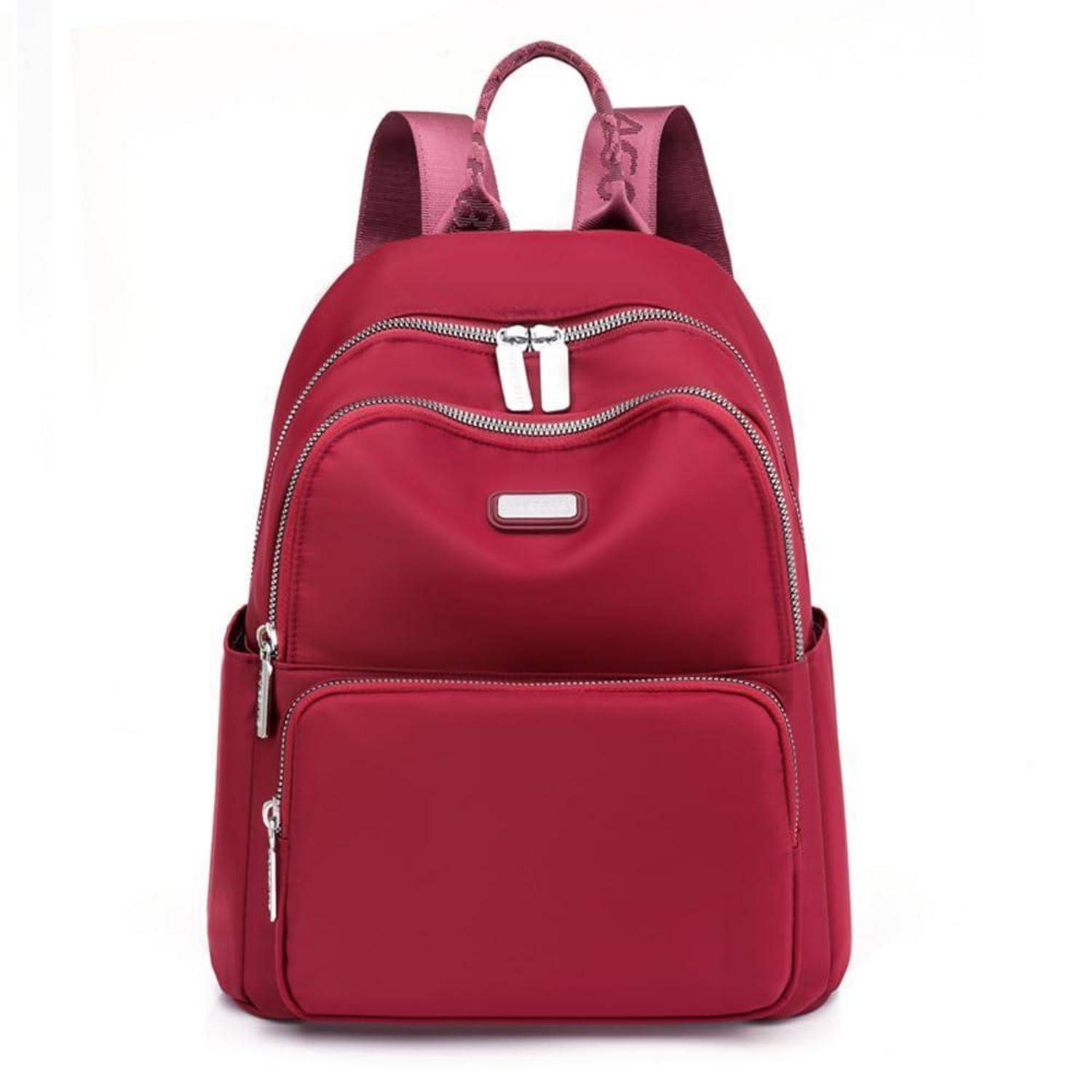 Roter Lederrucksack mit vorderen Reißverschlusstaschen und Griff oben auf weißem Hintergrund.