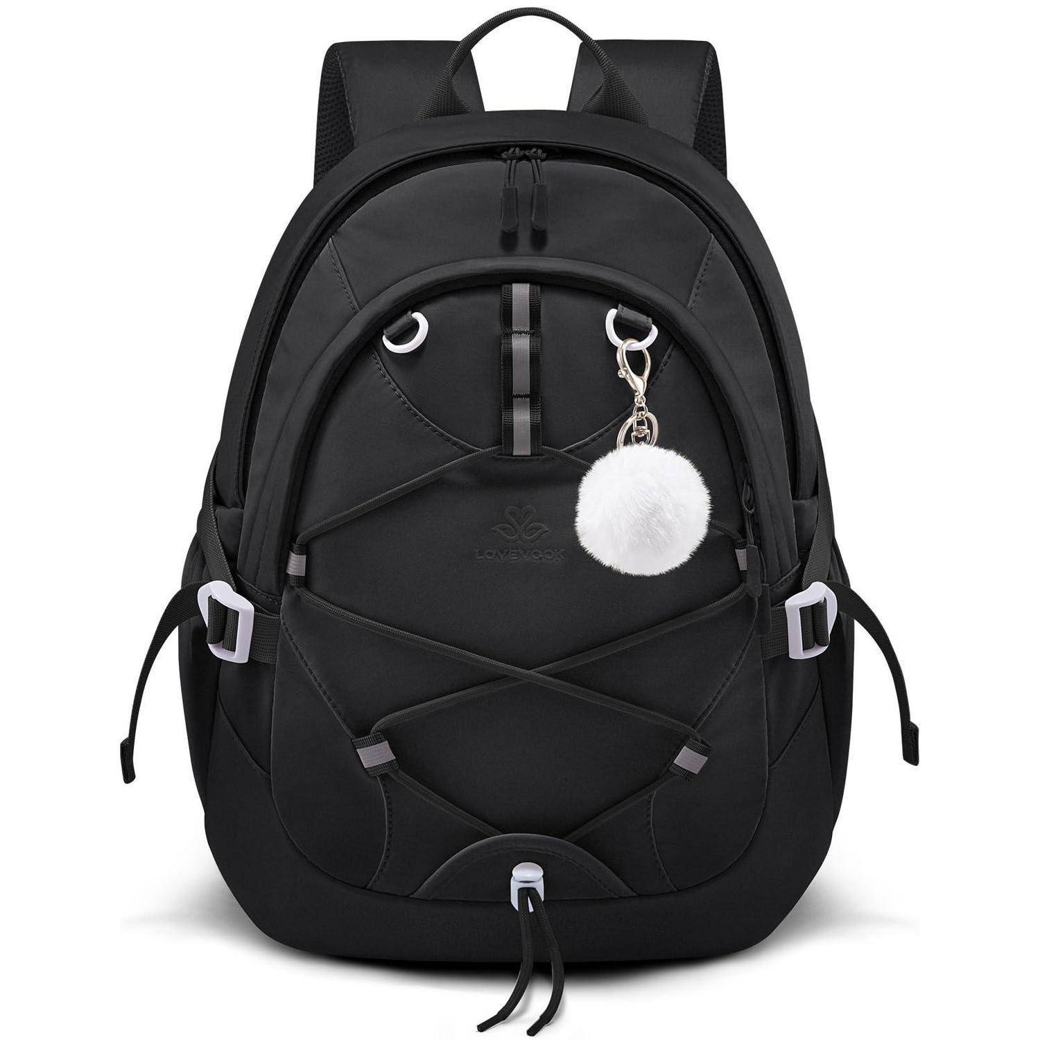 Schwarzer Rucksack mit vorderen Spanngurten, seitlichen Schnallen und einem weißen Bommel-Schlüsselanhänger, der am oberen rechten Reißverschluss hängt.