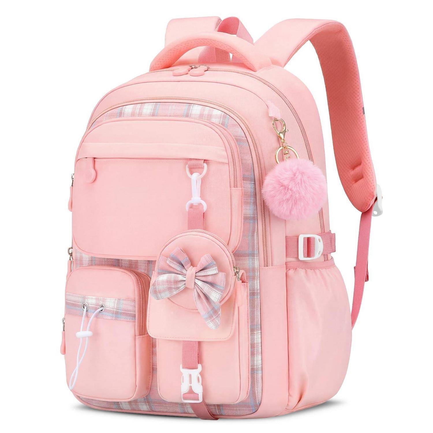 Rosa Rucksack mit Karomuster-Besatz, vorderen Taschen, einer Schleifentasche und einem flauschigen Schlüsselanhänger, auf einem einfachen weißen Hintergrund dargestellt.