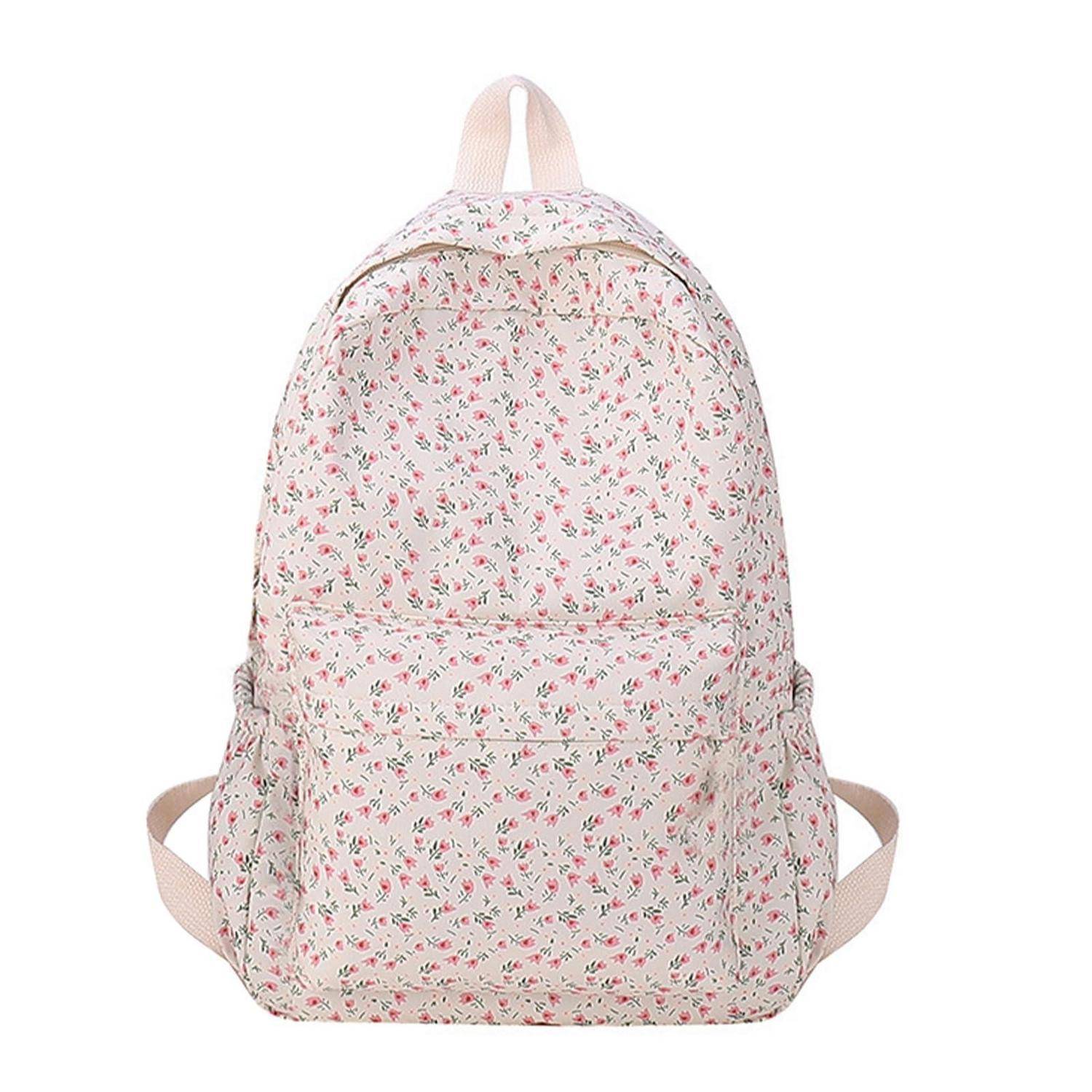 Rucksack in Blütenrosa mit Vordertasche, obere Schlaufe und Seitengurte auf weißem Hintergrund.