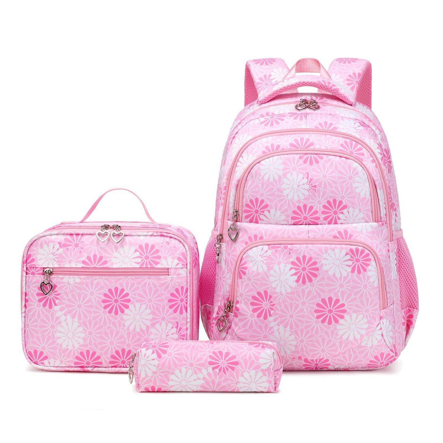 Rosa Blumenmuster-Rucksackset mit passender Lunch-Tasche und Federmäppchen auf weißem Hintergrund.