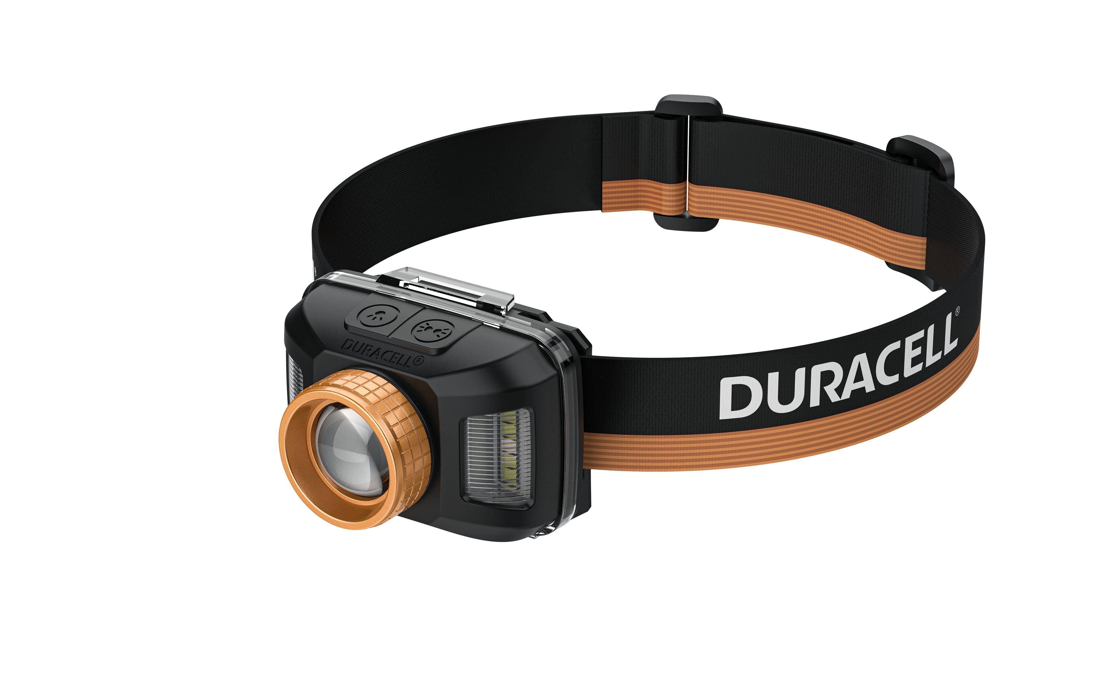 Schwarz-kupferne Duracell-Stirnlampe mit verstellbarem Kopfband, isoliert auf weißem Hintergrund dargestellt.