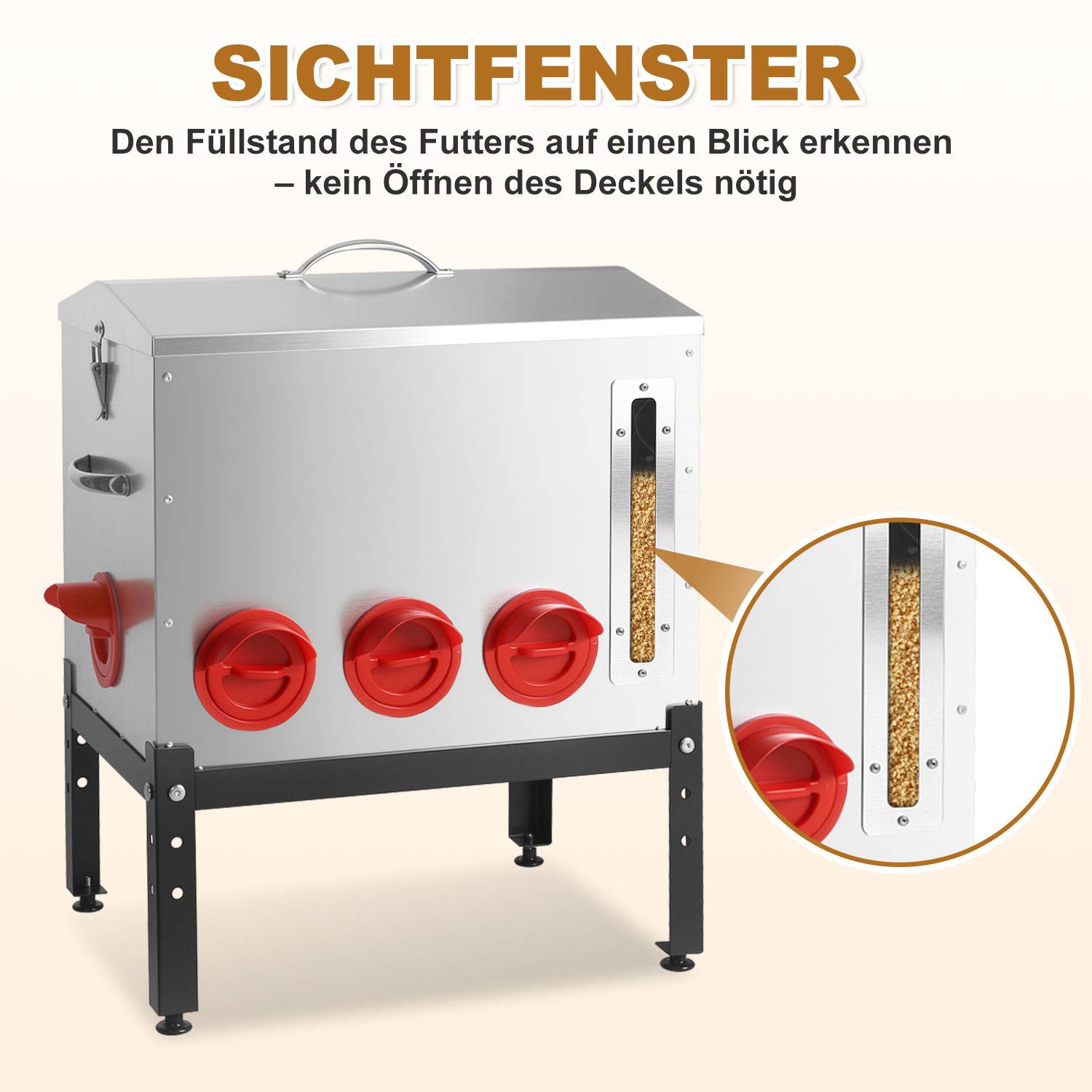 Edelstahlfötterer mit roten Auslässen und einem Sichtfenster, das den Getreidstand anzeigt, beschriftet mit „SICHTFENSTER" zum Überprüfen des Inhalts, ohne den Deckel zu öffnen.