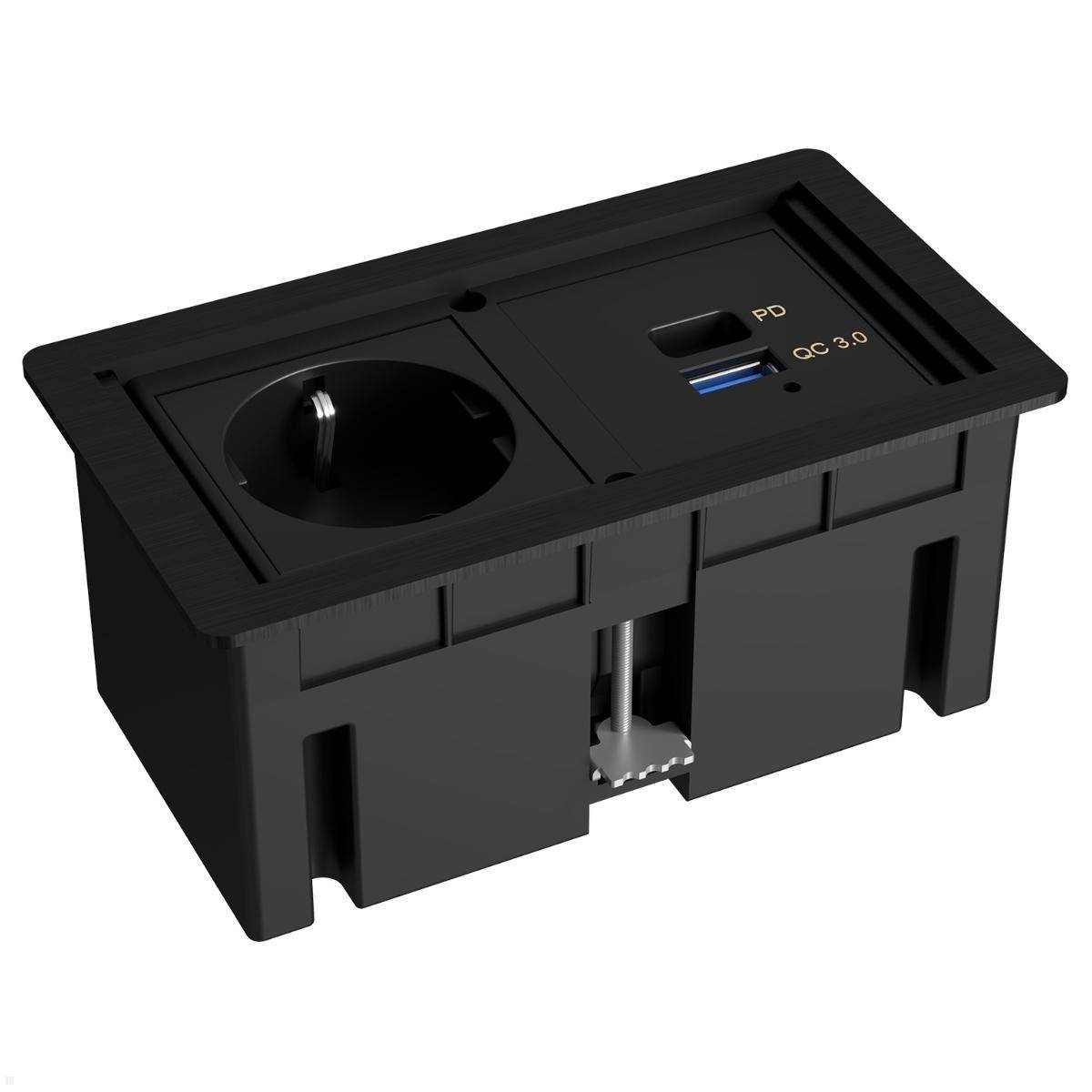 Schwarzes rechteckiges Schreibtisch-Stromauslass-Modul mit AC-Buchse und USB-C-/USB-A-Ladeanschlüssen mit den Bezeichnungen PD und QC 3.0.
