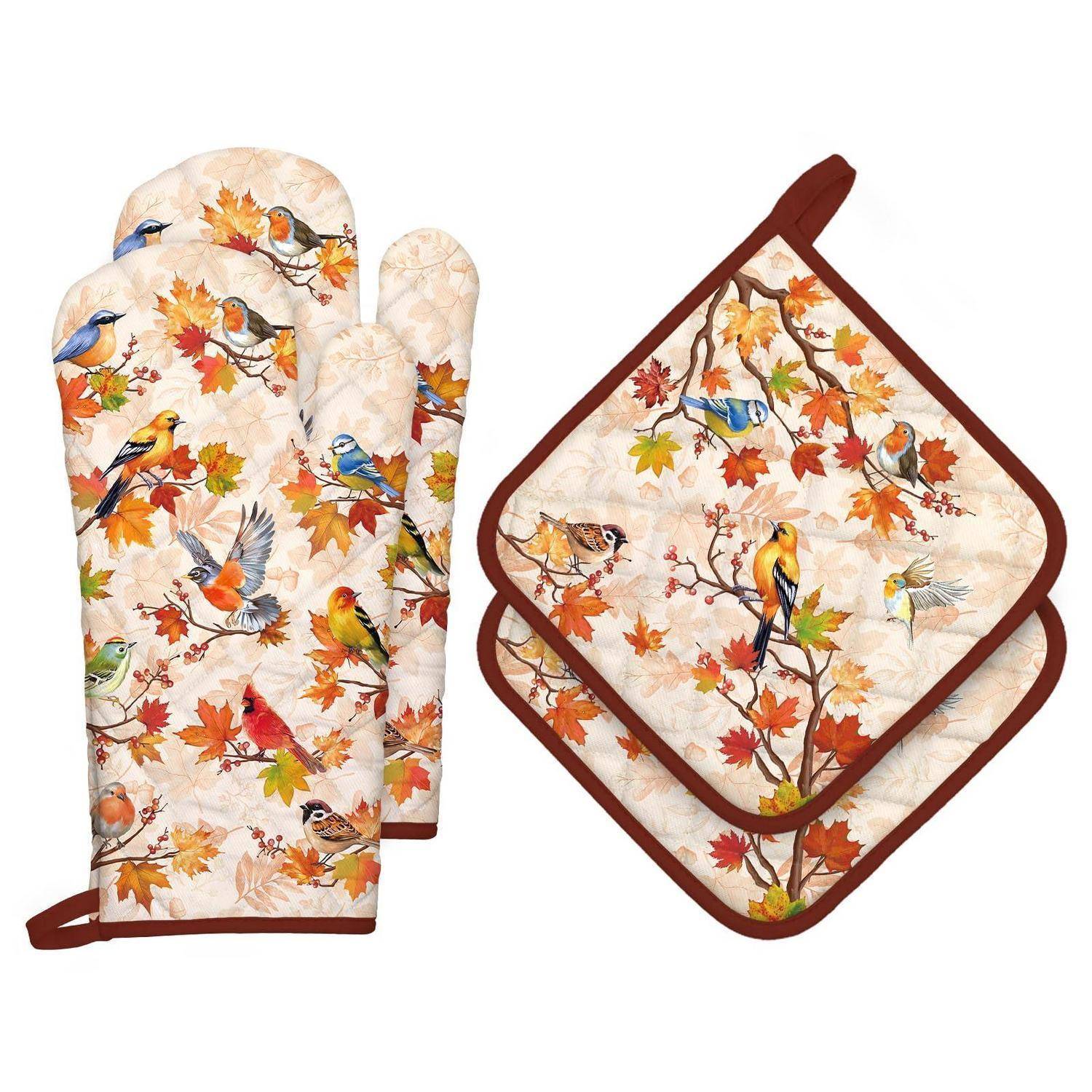 Gesteppter Ofenhandschuh, Topflappen und passendes Set mit Herbstblättern und bunten Vögeln auf cremefarbenem Hintergrund.
