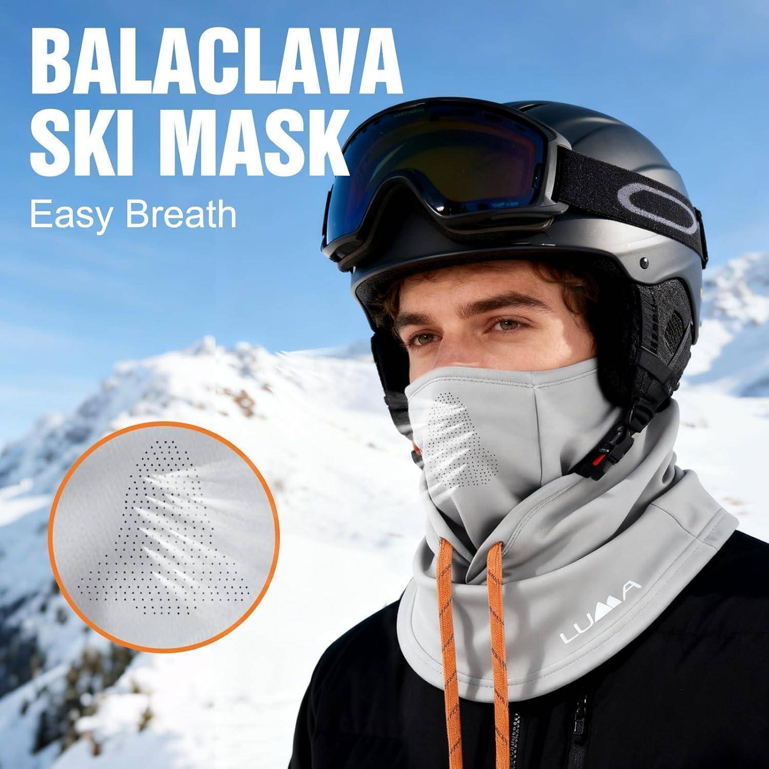 Werbebild eines Skifahrers mit Helm und hellgrauem Sturmhaube-Skischleier, mit Text „STURMHAUBE SKISCHLEIER" und „Einfaches Atmen"" über einem schneebedeckten Berghintergrund.