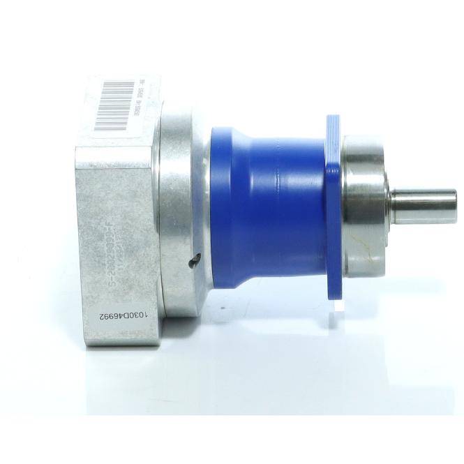 Nahaufnahme einer metallischen mechanischen Komponente mit einem blauen zylindrischen Mittelteil und vorstehender Welle, gezeigt auf weißem Hintergrund.