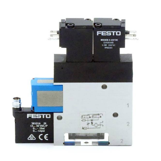 FESTO Industrie-Pneumatik-Magnetventilbaugruppe mit schwarzen, blauen und silbernen Komponenten und gedruckten Schaltungssymbolen auf der Vorderseite.