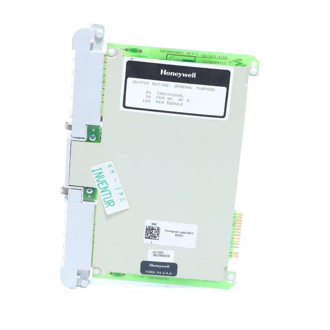Honeywell-Industrieelektronik-Steuermodul mit beschrifteten Anschlüssen und Statusaufklebern auf hellem Hintergrund.