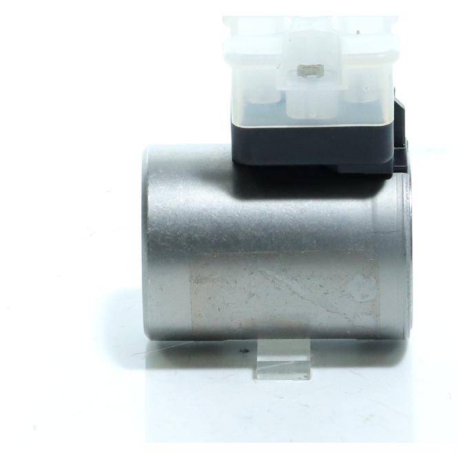 Metallischer zylindrischer Motor mit einem durchsichtigen Kunststoffbehälter oben montiert, vor weißem Hintergrund dargestellt.