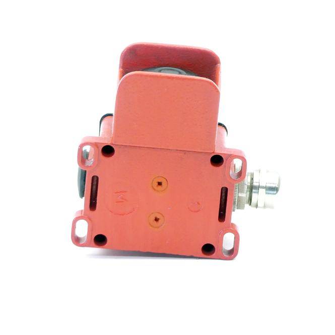 Rotes mechanisches elektrisches Schalter- oder Stellantriebgehäuse mit Montagelöchern und einer vorstehenden Metallwelle, dargestellt auf weißem Hintergrund.