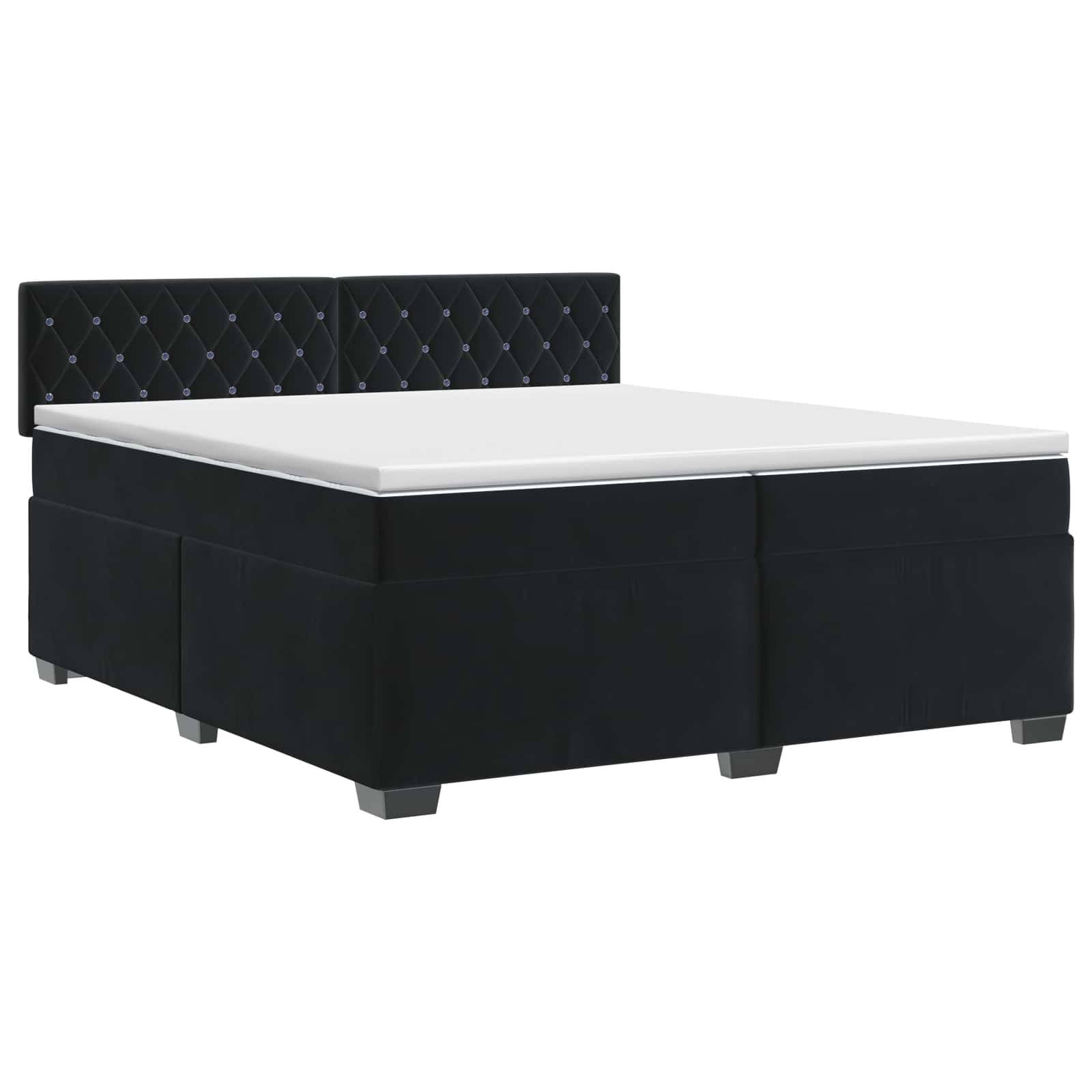 Schwarzes gepolstertes Bett mit gestepptem Kopfteil und weißer Matratze auf weißem Hintergrund.