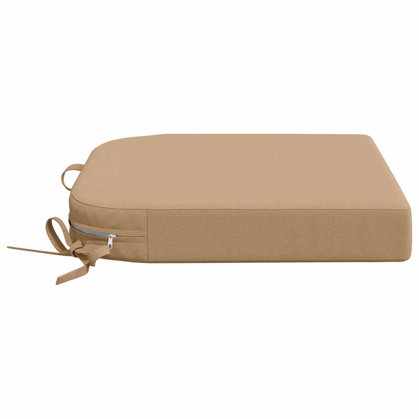 Beige rechteckiges Kissen mit Reißverschluss und Bindebändern, in der Seitenansicht auf weißem Hintergrund dargestellt.