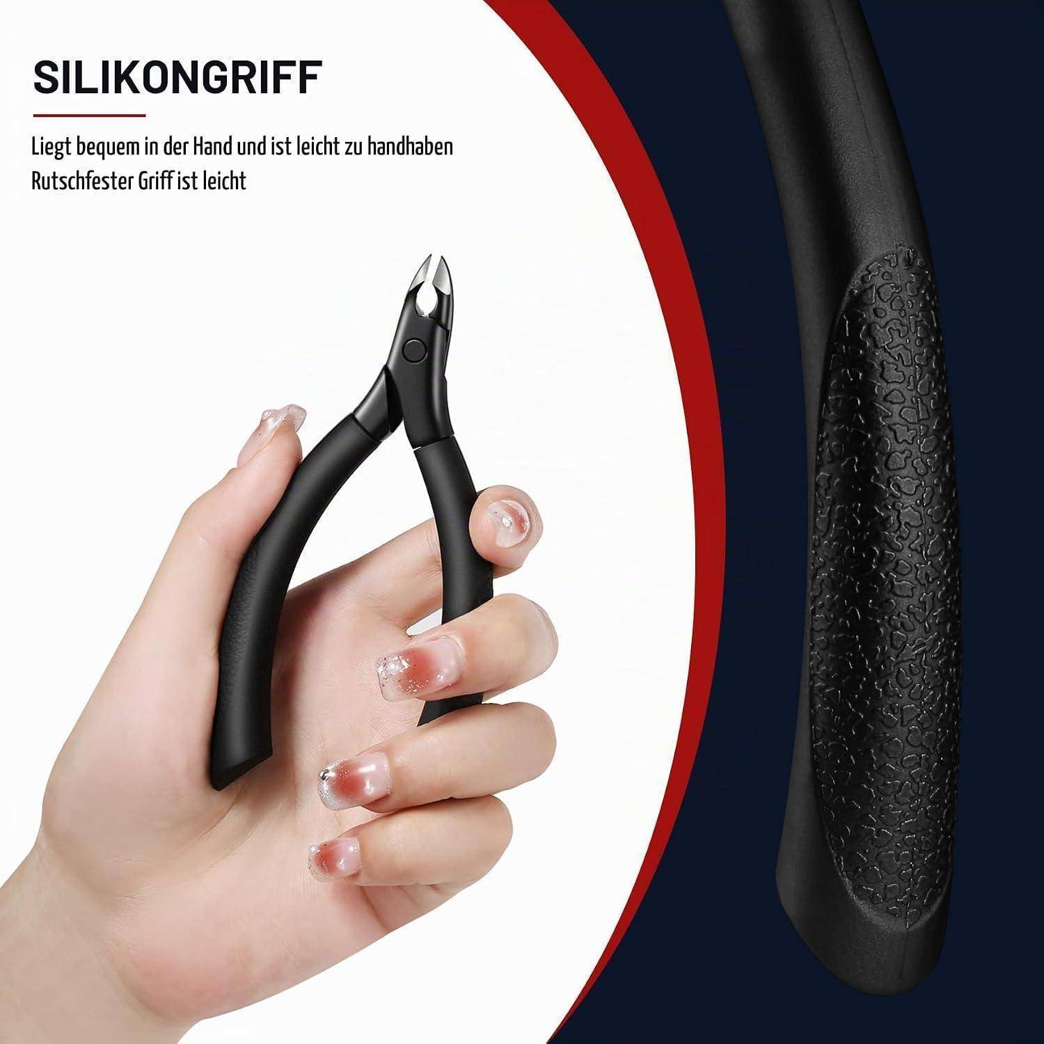Produktbild zeigt schwarze Nagelknipser mit Silikongriffen, in einer Hand gehalten; deutscher Text sagt „SILIKONGRIFF" und vermerkt, dass der Griff bequem und rutschfest ist.