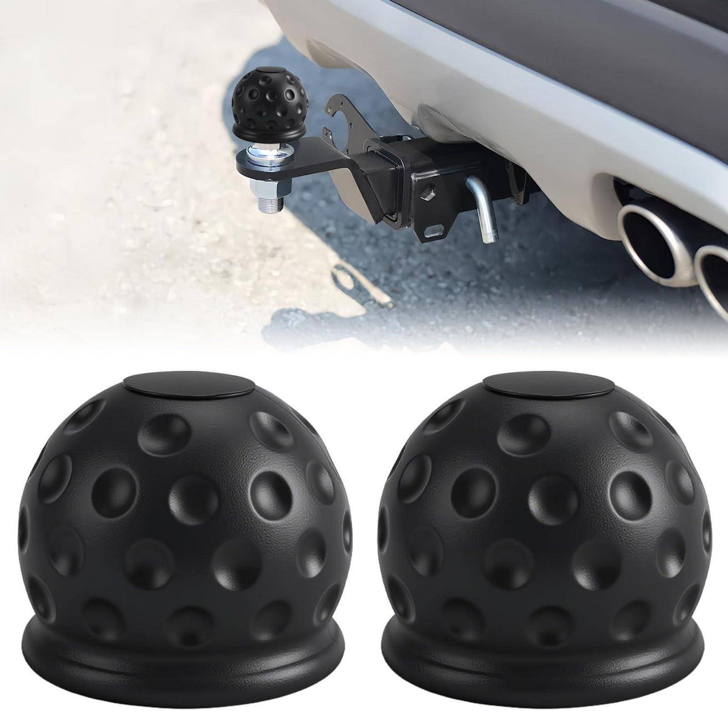 Autoheck-Anhängerkupplung mit abnehmbarem schwarzem Golfball-ähnlichem Zugdeckel; zwei passende Abdeckungen werden unten gezeigt.