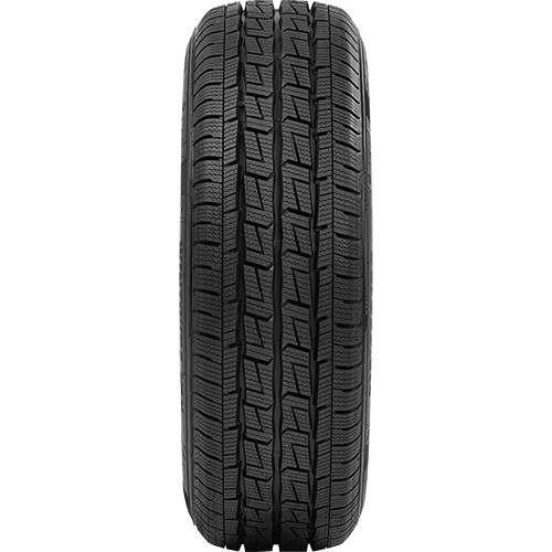 Ein schwarzer Autoreifen aufrecht gegen einen schlichten schwarzen Hintergrund gezeigt.