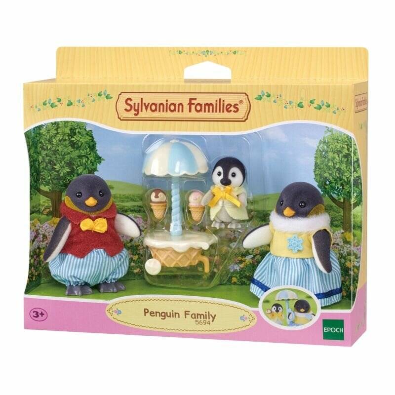 Sylvanian Families Pinguinfamilie Spielzeugset in einer Box mit drei Pinguinfiguren und einem kleinen Regenschirm-Wagen-Zubehör.