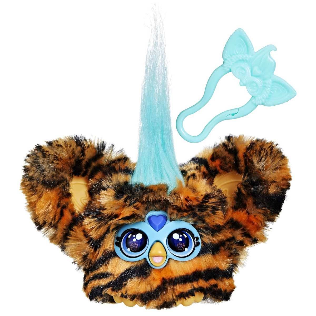 Kuscheliges Tiger-gestreiftes Spielzeug mit blauen Augen, rosa Ohren und einem hohen blauen Büschel, gezeigt mit einer türkisfarbenen schmetterlingsförmigen Klammer.
