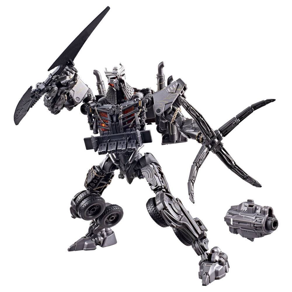 Eine grau gefärbte roboterhafte Krieger-Actionfigur in Pose mit einem großen Schwert und einer Armbrust, gezeigt mit einem abnehmbaren Waffenzubehör auf weißem Hintergrund.