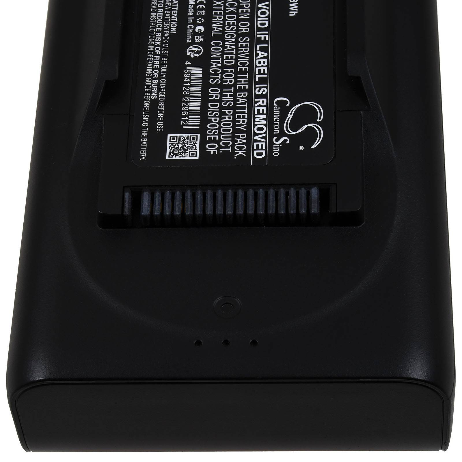 Nahaufnahme eines schwarzen Batteriepakets mit einem Warnschild, auf dem 