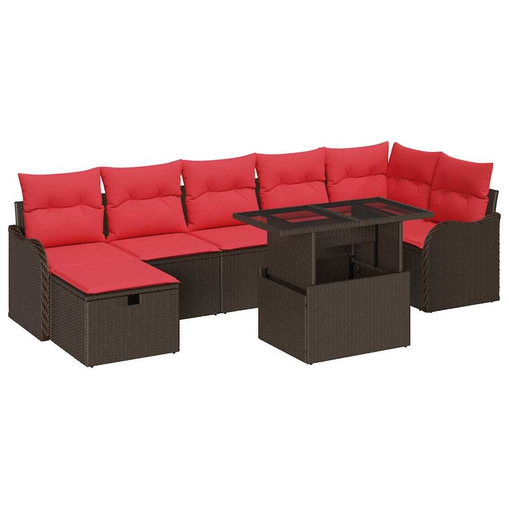 Braunes Rattangarnituren-Sofa für den Außenbereich mit roten Kissen und passendem Glastisch auf weißem Hintergrund.