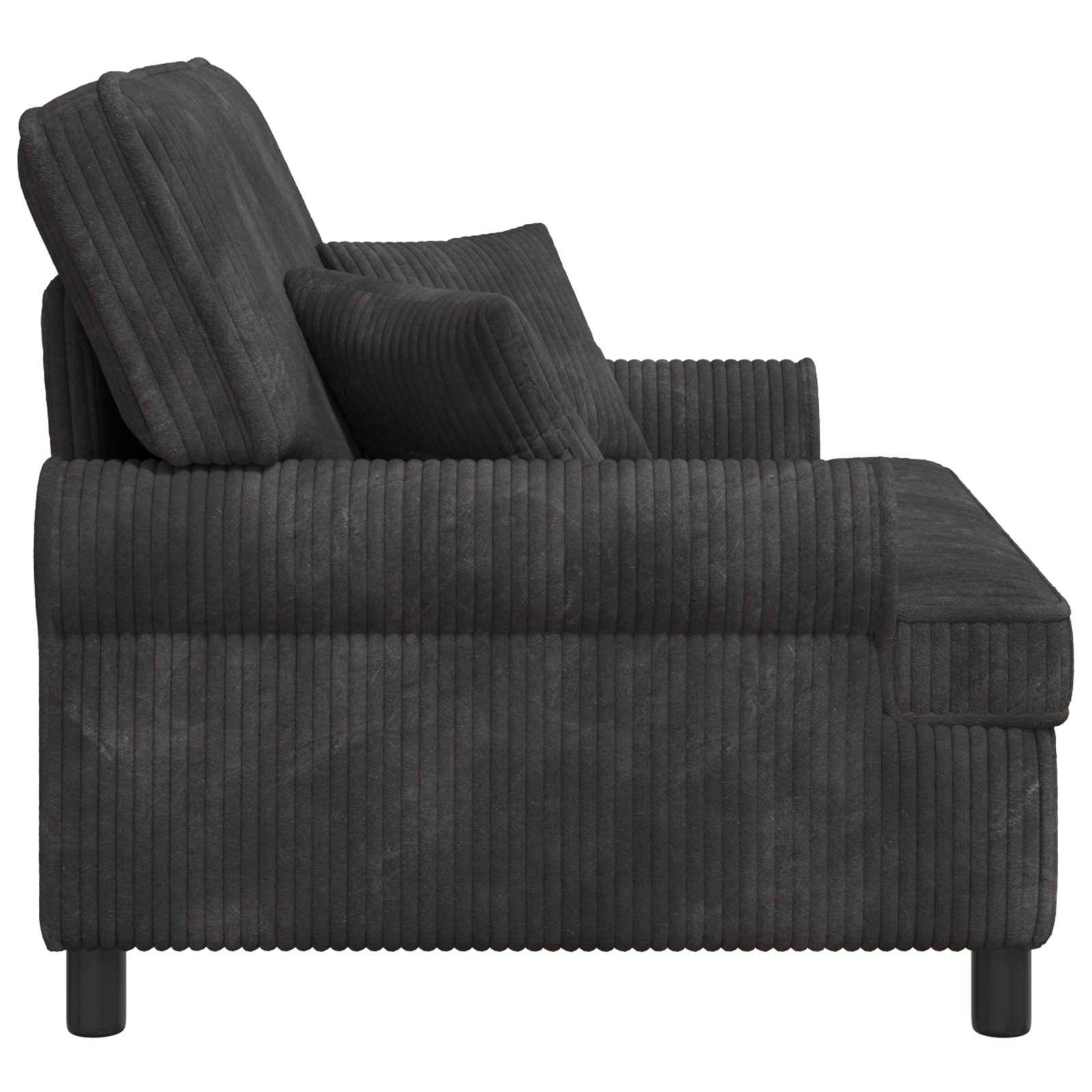Seitenansicht einer dunkelgrauen, mit Kordsamtstoff gepolsterten Chaiselongue mit zwei passenden Kissen auf weißem Hintergrund.