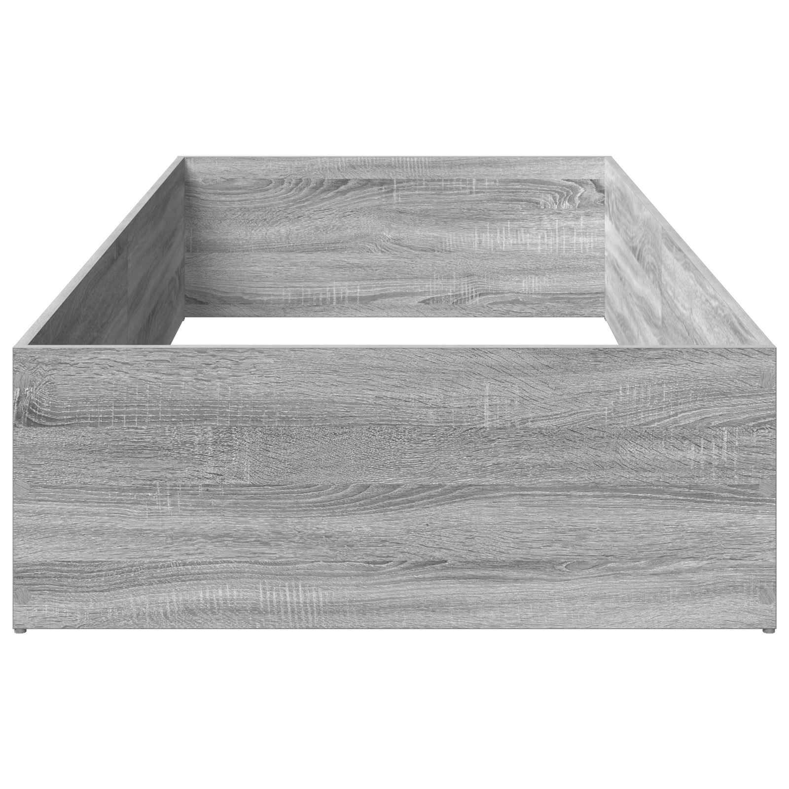 Ein grauer Bettrahmensockel mit Holzmaserung, auf weißem Hintergrund dargestellt, von vorne und leicht von oben betrachtet.
