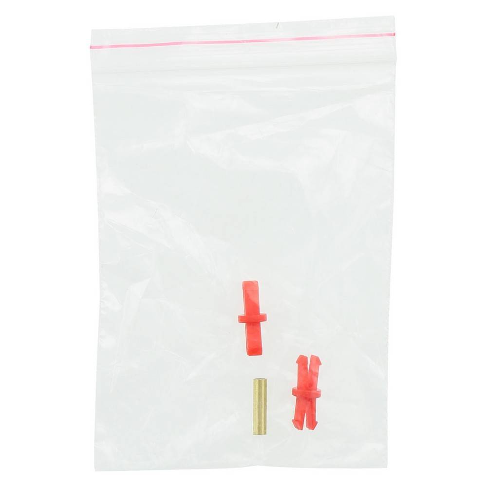 Durchsichtige Plastiktüte mit Reißverschluss und rosa Versiegelungsstreifen, enthält zwei kleine rote Kunststoffclips und ein goldenes zylindrisches Stück.