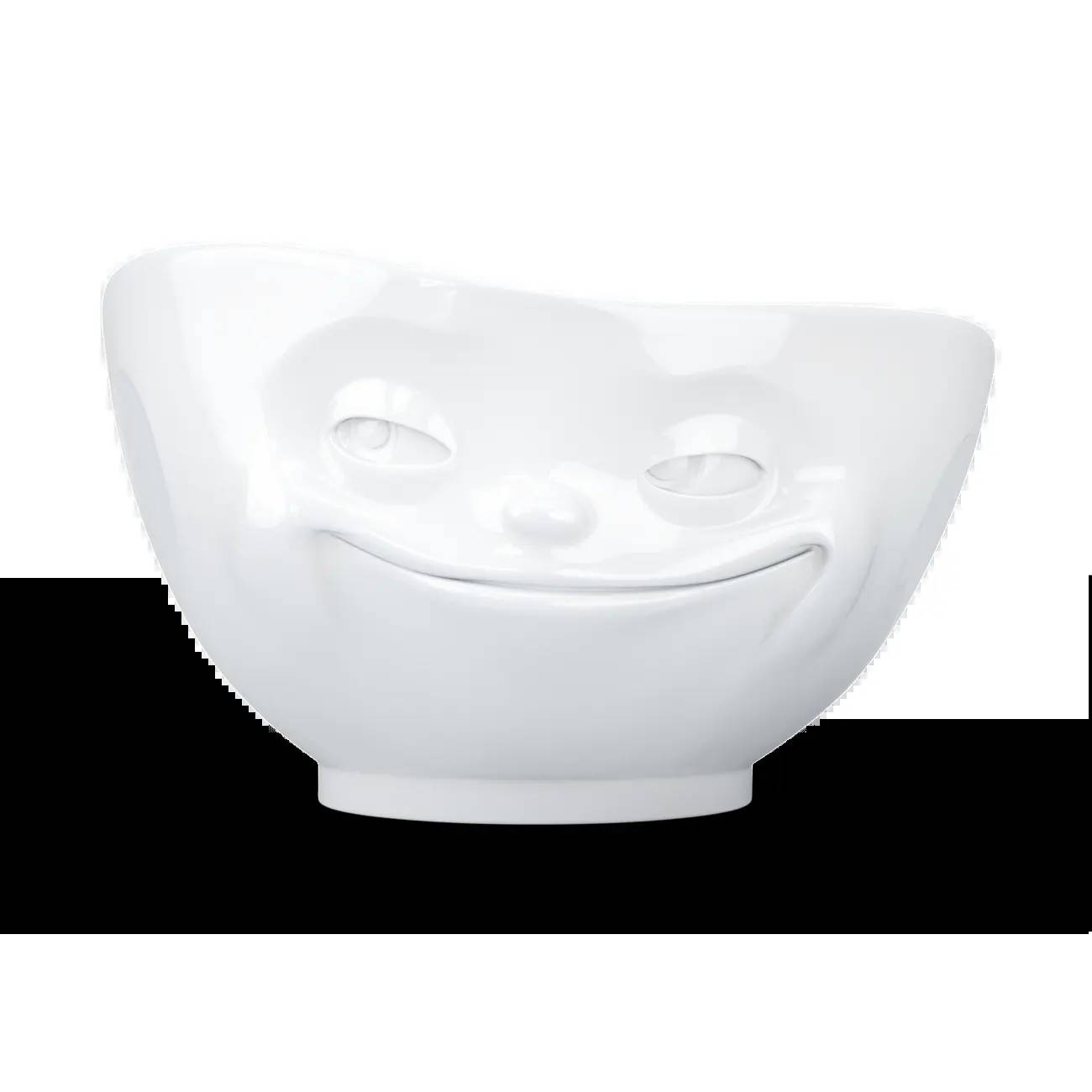 Weißer Keramikteller mit einem lächelnden Gesichtsdesign auf schwarzem Hintergrund.