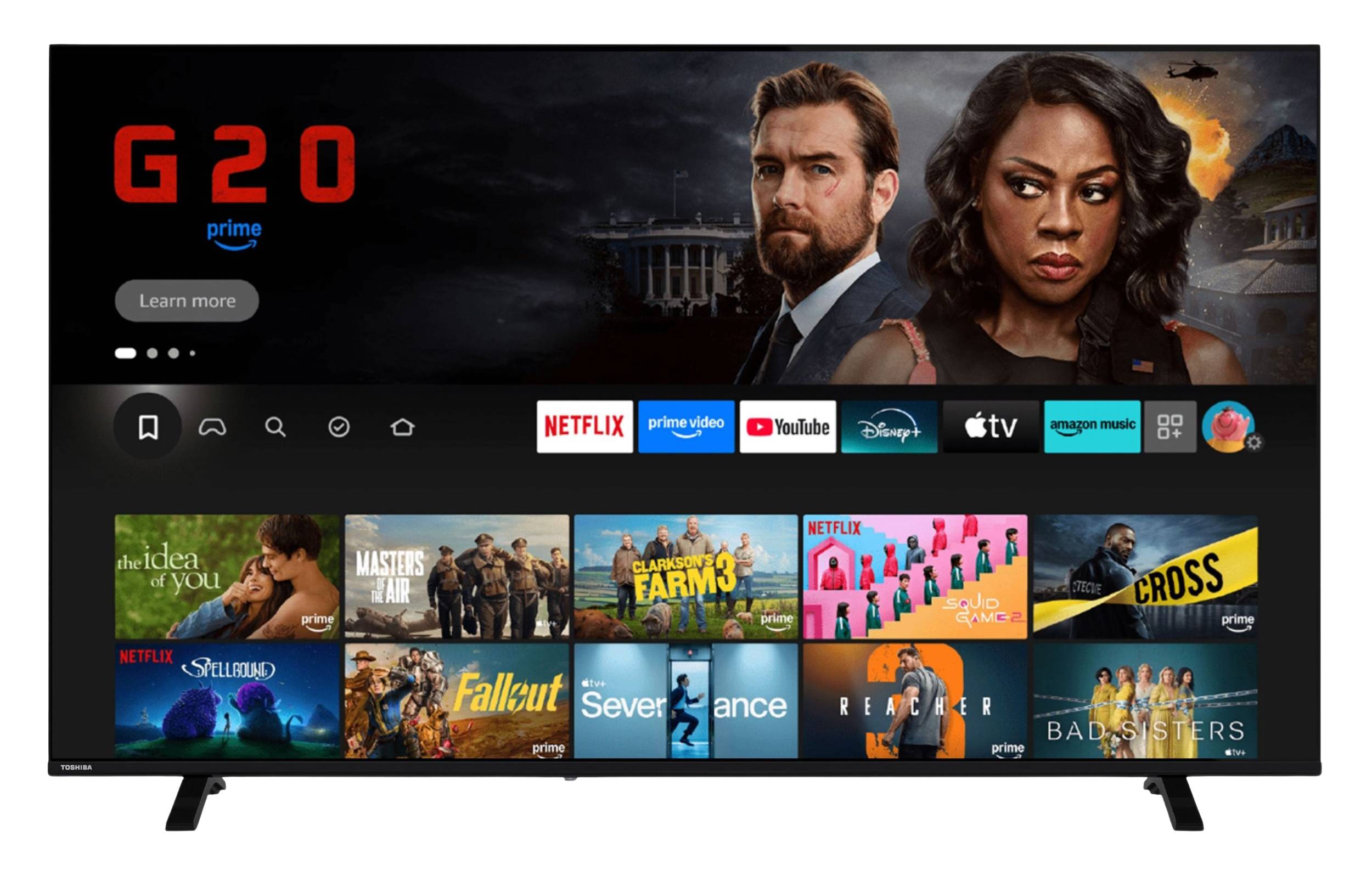 Amazon Fire TV Startbildschirm auf einem Fernseher, mit dem Banner „G20" von Prime Video, das eine Schaltfläche „Mehr erfahren"" enthält, und Reihen von Streaming-App- und Show-Kacheln darunter.