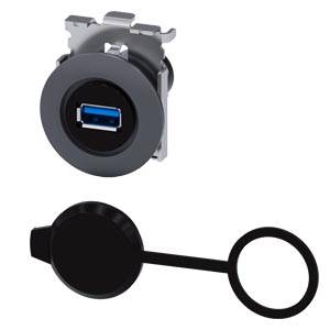 Panelmontierter USB-Anschluss mit schützender angebundener Staubkappe, offen und geschlossen dargestellt.
