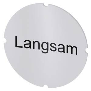 Rundes graues Etikett mit dem deutschen Wort 'Langsam' in schwarzer Schrift gedruckt.