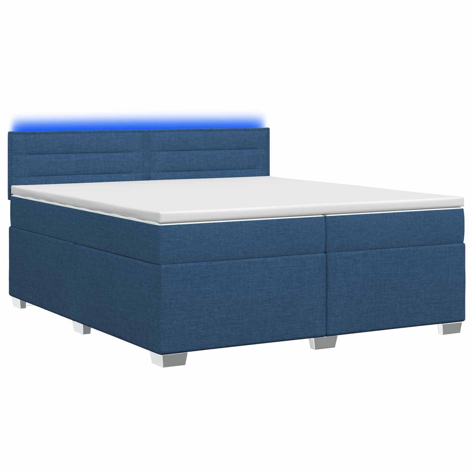 Bett mit blauem Polsterstoff, weißer Matratze und gepolstertem Kopfteil, auf weißem Hintergrund abgebildet.